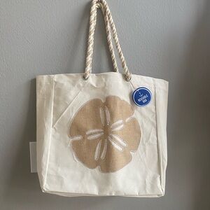 NWT Sand dollar Beige and White Tote Bag with Rope Handles. Brand new.